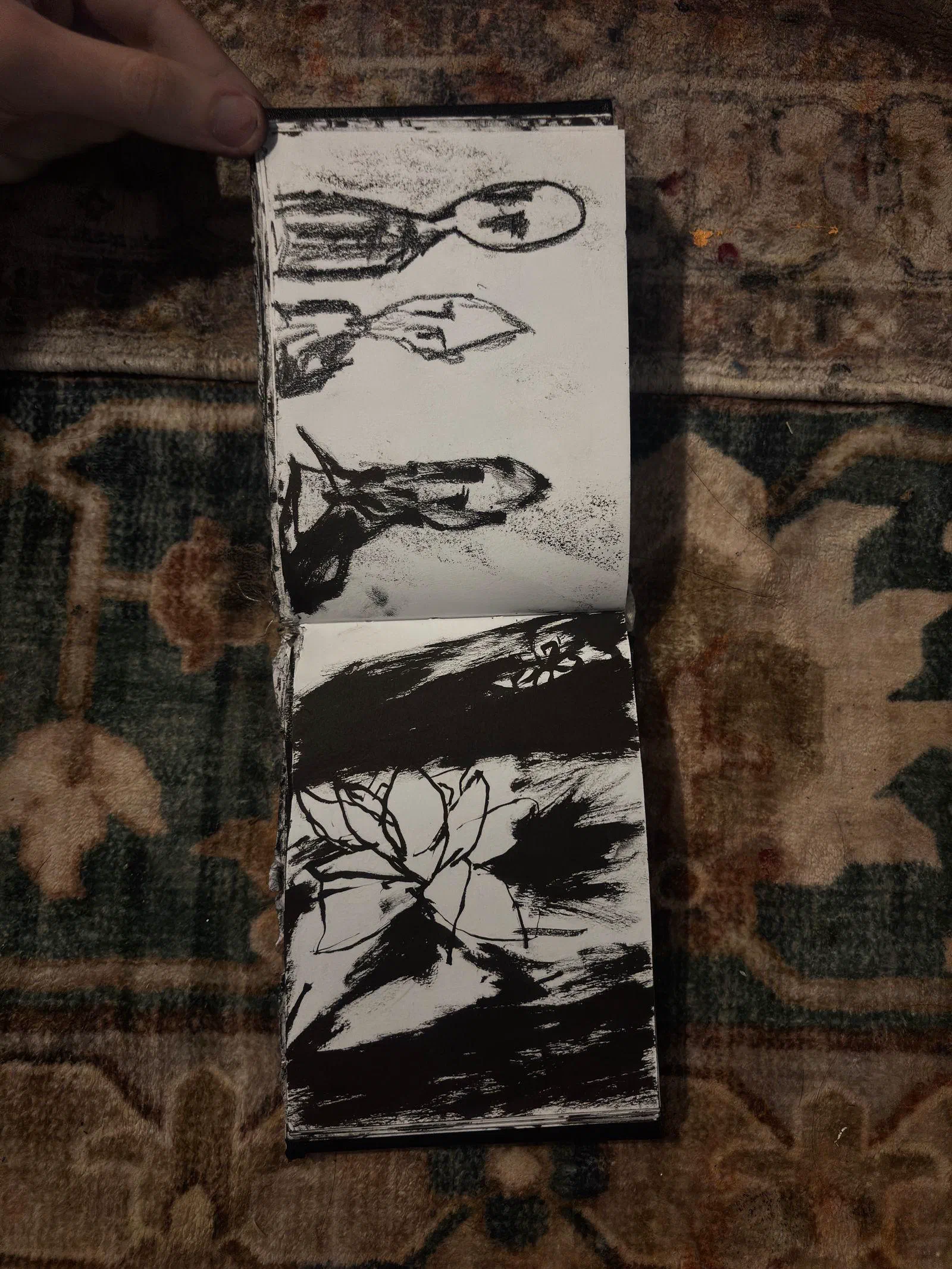 A sketchbook spread: three heads and a flower, August 2026.