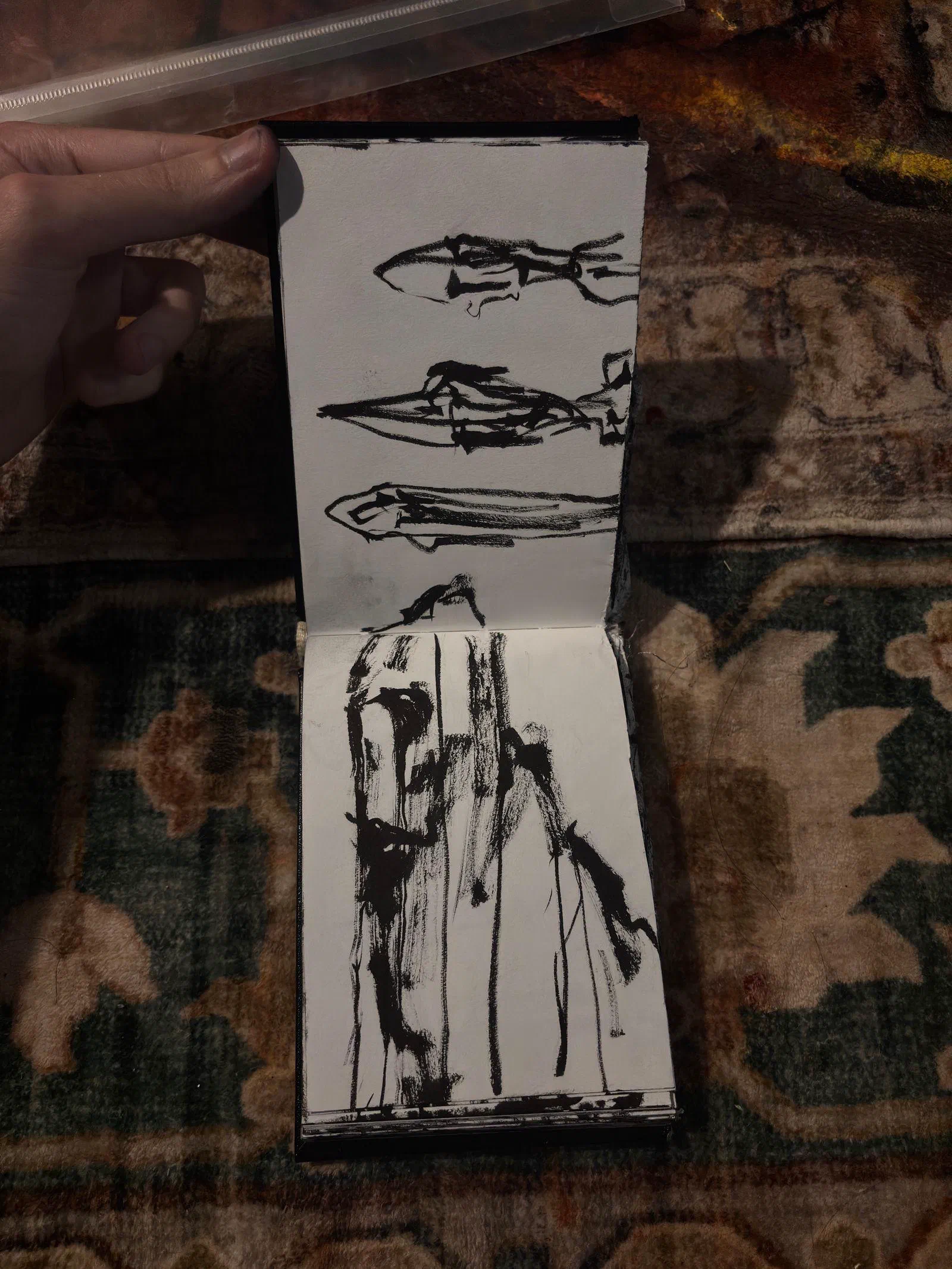 A sketchbook spread: three heads above a tall figure, August 2026.